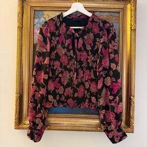 A classy Going Out Top